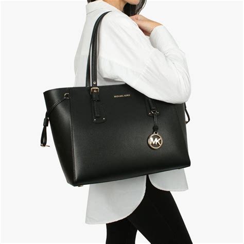 michael kors voyager bag|Michael Kors saffiano leather bag.